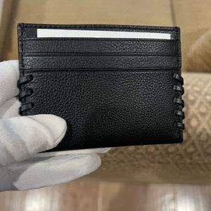 Coach black leather baseball stitch card case